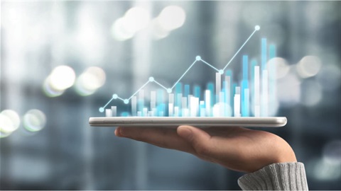 Hand-holding-a-tablet-with-a-hologram-of-statistics-above-it-1030x579.jpg