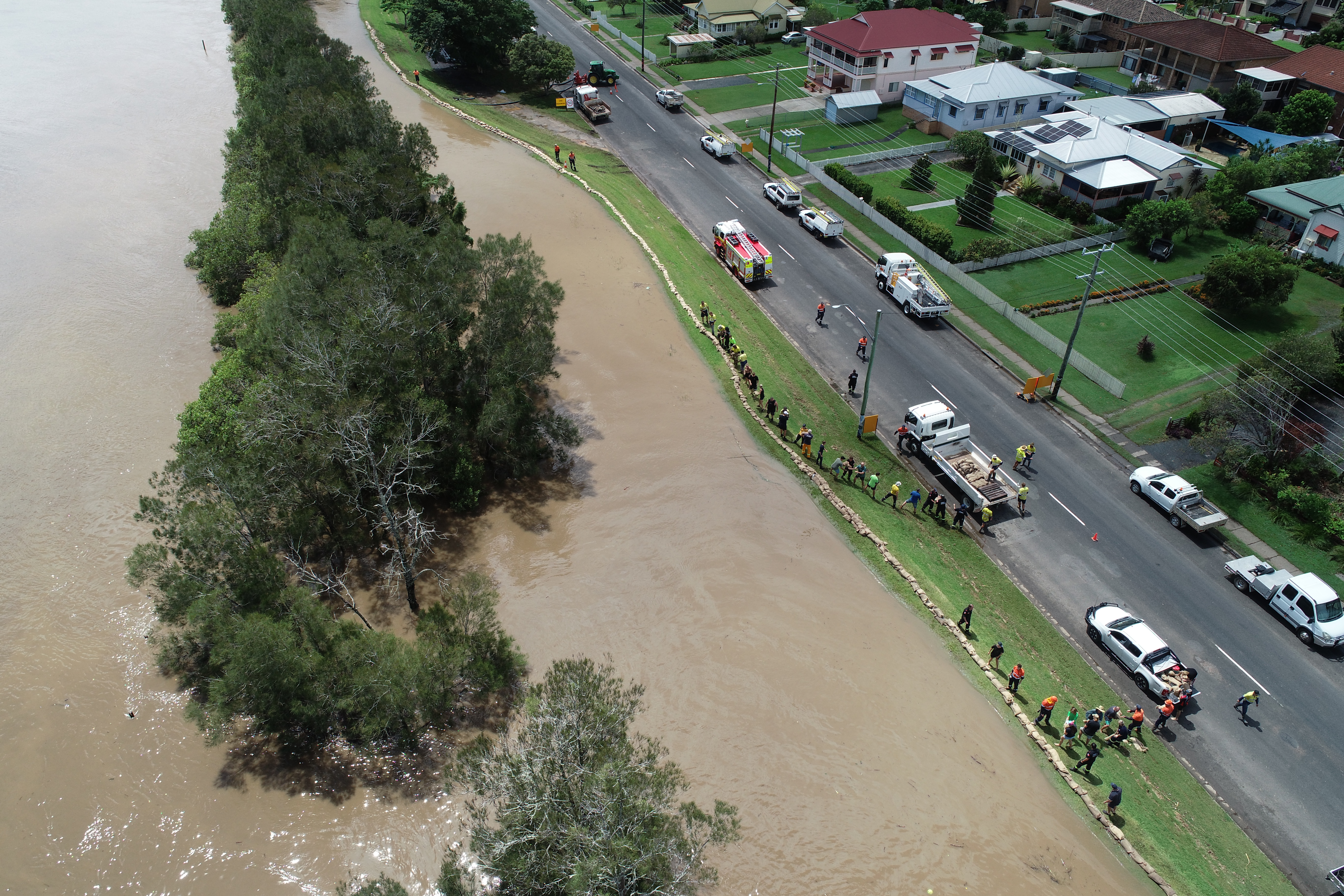 Aerial of sandbagging Maclean levee during 2022 floods.JPG